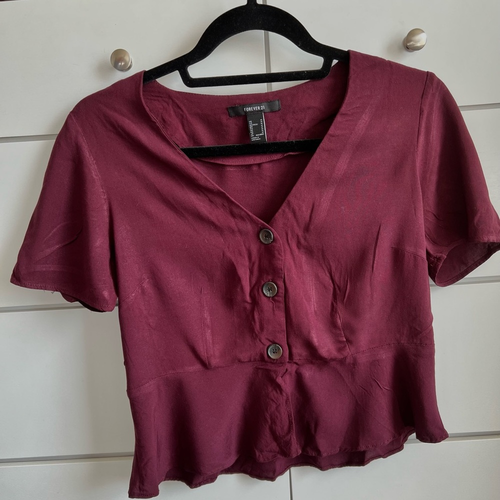 Forever 21 button up blouse in a maroon color in a size M